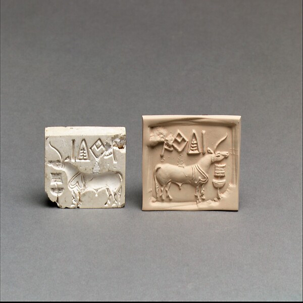 An Indus stamp seal (left) and a modern clay impression of it (right): the so-called unicorn facing a cult object, with a short row of signs along the top.